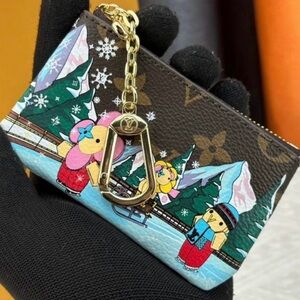 Lot of 4 LV holiday pouch RESERVED